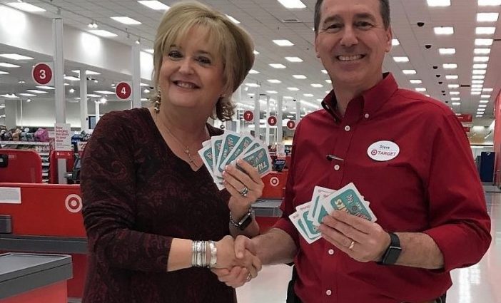 MCCC's Jane Nauman shaking hands with Steve Rice at Target